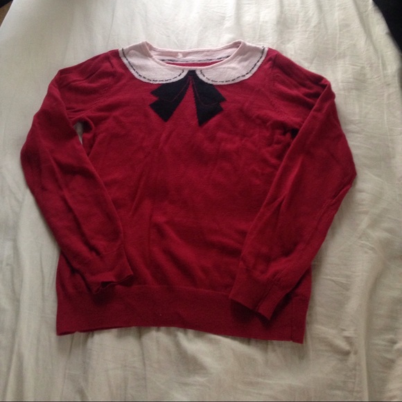 Red collar stitched sweater shirt.