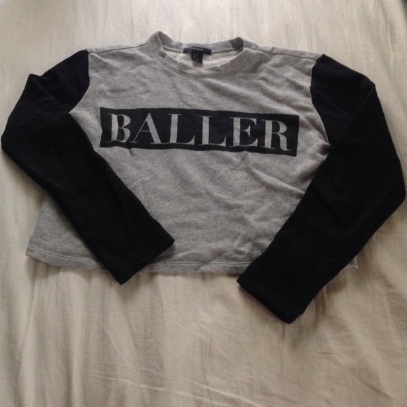 BALLER cropped sweater.