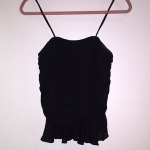 Black strapless peplum top