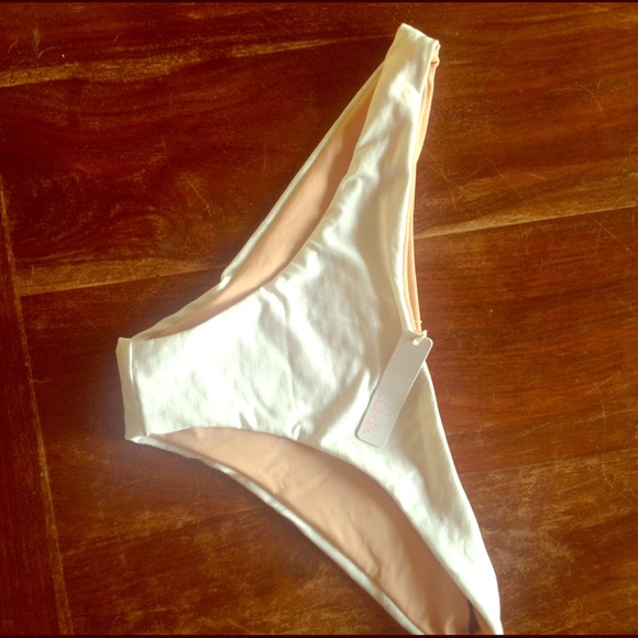 NWT Lolli swimsuit white and pink bottoms.