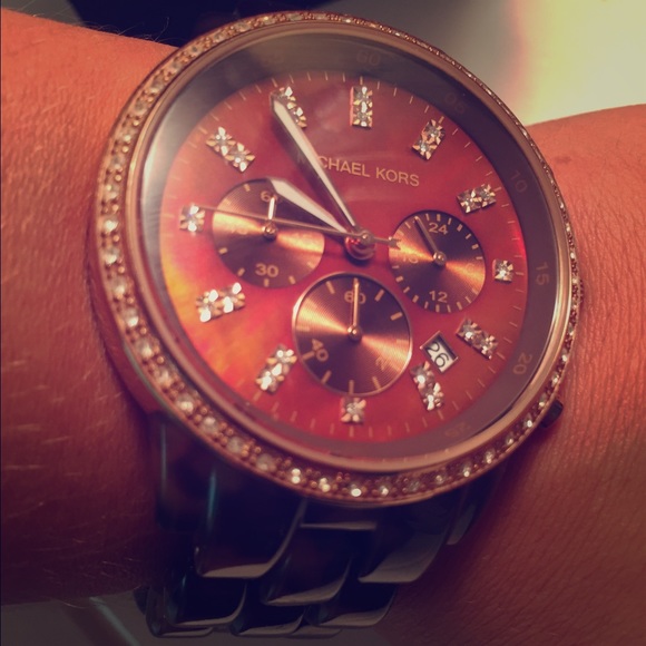 Large rose gold Michael Kors with tortoise band
