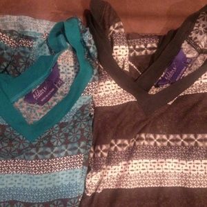 Two patterned long sleeve V neck shirts