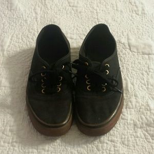 Black an goldish brown vans