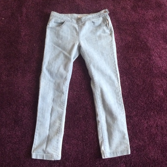 Light jeans with zipper on the side