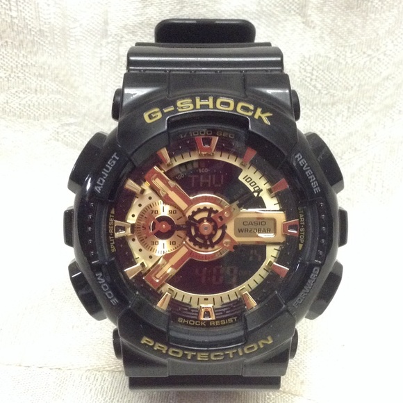 Reduced price- Men's Black and Gold G-shock