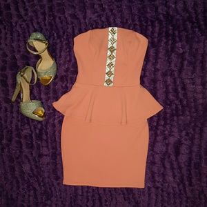 Pink strapless peplum dress