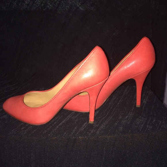 Coral round toe pumps.