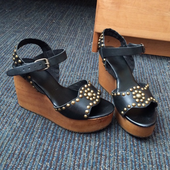 Studded black wedges with wooden heel