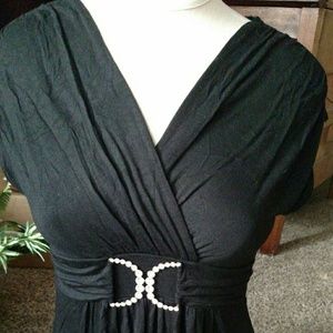 Black dress top; never worn