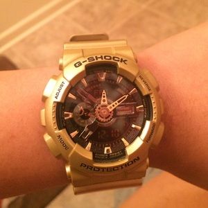 Gold gshock watch and can