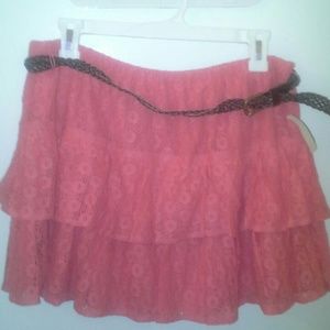 Miniskirt.   Orange knit lace with brown belt