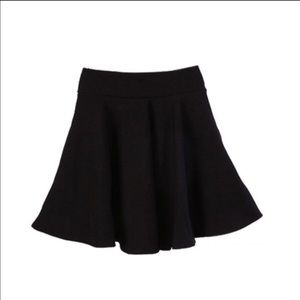 Stretchy black short skater skirt. Stretchy black short skater skirt.