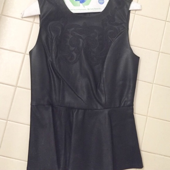 Beautiful detailed leather peplum top