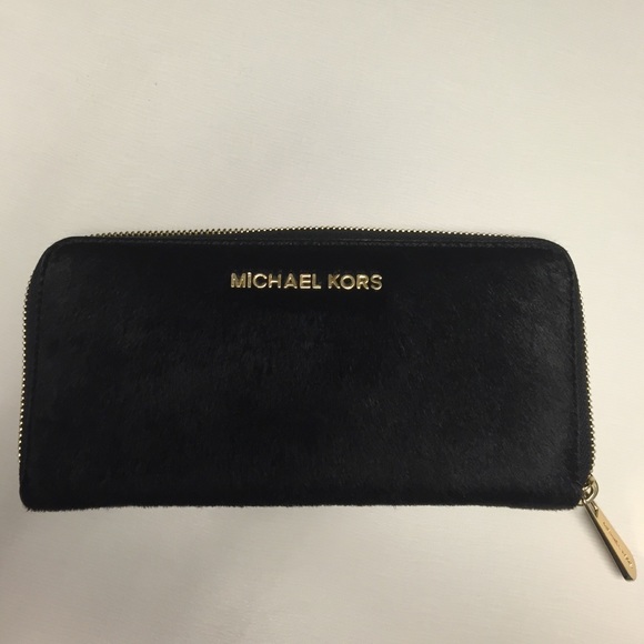 SOLD Michael Kors Haircalf with Leather Trim