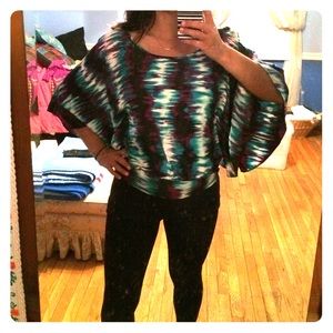 Rampage flutter top size Medium- cross-cross back