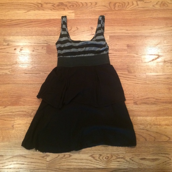 Black dress with stripped silver accents.