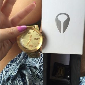 Gold Nixon Watch
