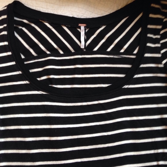Long sleeved black and white striped shirt