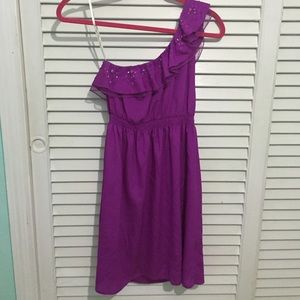 Magenta one-shoulder dress.