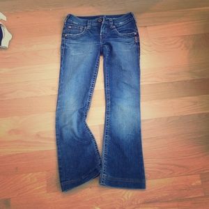 Silver jeans. Perfect condition, a little edgy.
