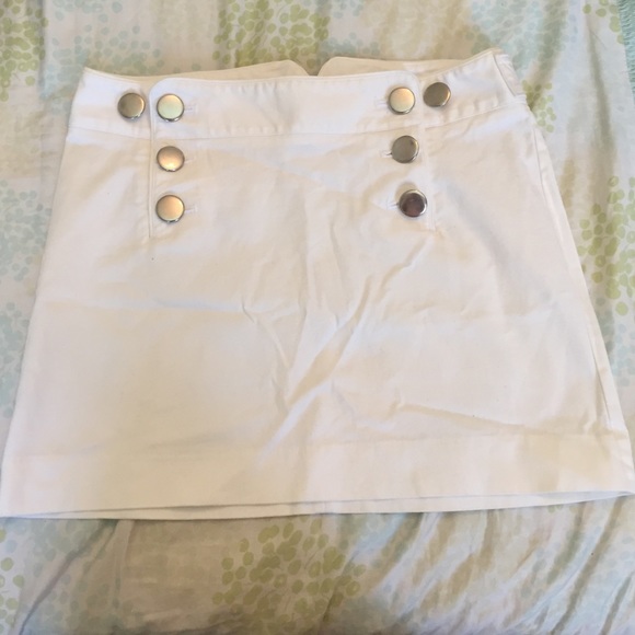 White express skirt with large silver buttons