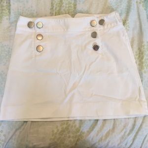 White express skirt with large silver buttons