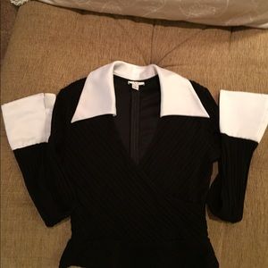 Cache dressy black top with white cuffs & collar