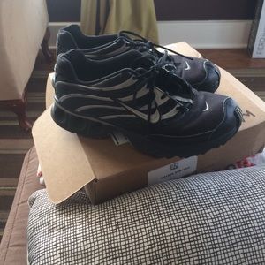 Black nike running sneakers.