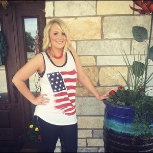 Cute Americana tank is 95% rayon and 5% spandex.