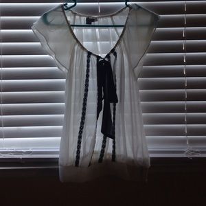 Sheer white top with black lace trim
