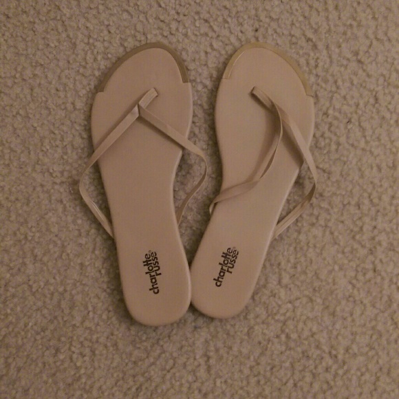 Tan colored flip flops