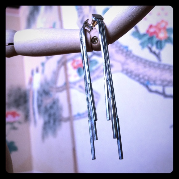 Silver costume dangle earrings