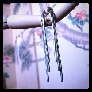 Silver costume dangle earrings