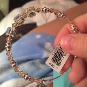 Brand new Alex and ani never worn light pink