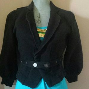 Black sweater/blazer. Great details.