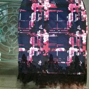 Floral print skirt and black lace see through top