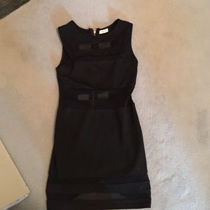 Black bodycon dress with mesh cutouts