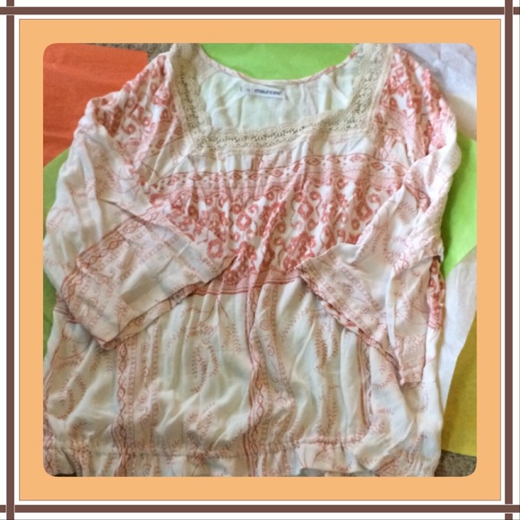 Peach and ivory, elastic bottom.