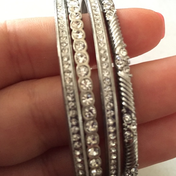 Set of four silver bangles. Lia Sophia.