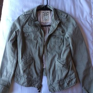 Green outerwear jacket