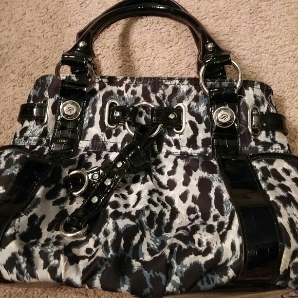 Used rosetti lepard purse