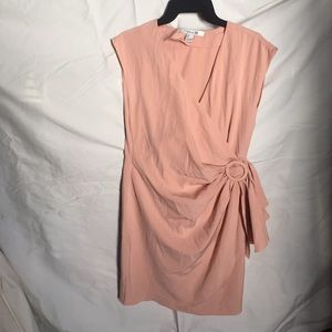 Nude colored dress with sash/ruffle on the side
