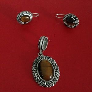 Silver pendant and earrings with brown stone