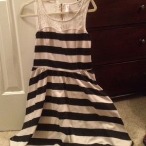 Lace striped dress with zipper detailing.