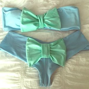Lolli bow bathing suit! Like new! Sz L Fits m or l