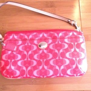 Authentic coach clutch