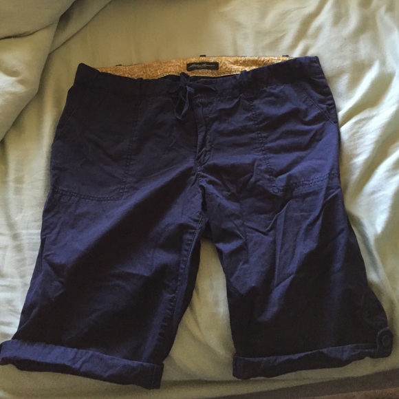 Navy cotton shorts and white vest