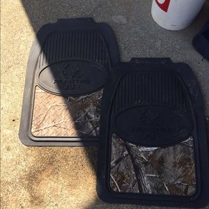 Two real tree car floor mats