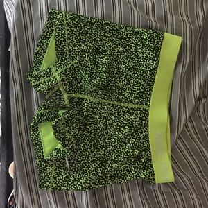 Green cheetah Nike pros