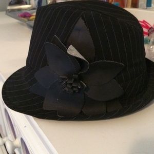 Black and white stripe hat with a flower